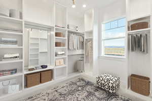 Mudroom with light carpet and recessed lighting