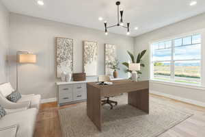 Office featuring recessed lighting, a chandelier, light wood-type flooring, and a mountain view