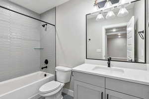 Full bathroom with bathing tub / shower combination and vanity