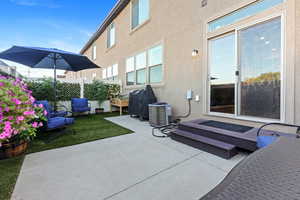 View of patio with area for grilling