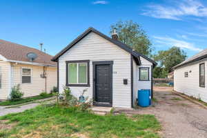 View of front of house with a chimney