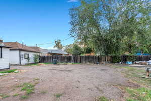 View of fenced backyard
