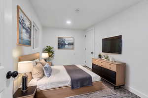 Bedroom featuring baseboards and recessed lighting