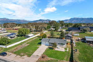 View of subject property featuring mountains