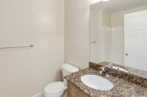 Bathroom with vanity and a shower