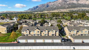 Aerial view of residential area featuring mountains