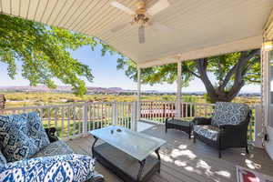 Wooden terrace with a ceiling fan