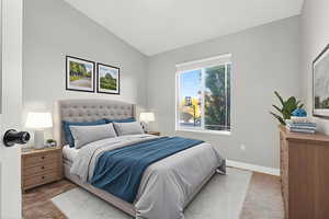 *Virtually Staged* Bedroom with vaulted ceiling and baseboards