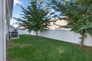 View of fenced backyard