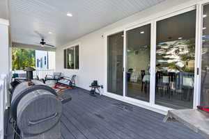 Wooden terrace with ceiling fan