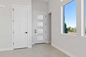 Foyer entrance featuring plenty of natural light