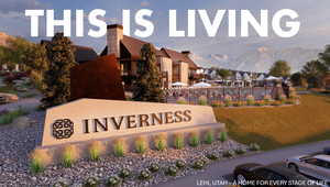 Community sign featuring a mountain view, a lawn, and a residential view