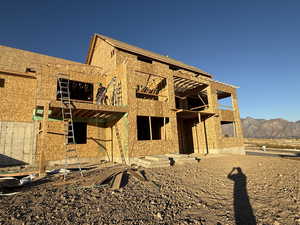 View of front of house featuring a patio, a mountain view, and a pergola