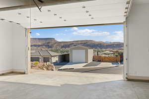 Garage featuring a mountain view