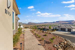View of mountain background featuring nearby suburban area