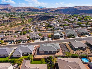 Aerial view of residential area featuring mountains