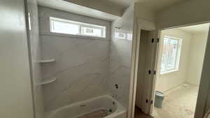 Bathroom featuring bathtub / shower combination