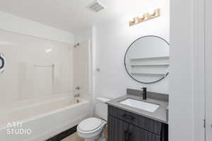 Full bath with vanity,  shower combination, and light tile patterned floors