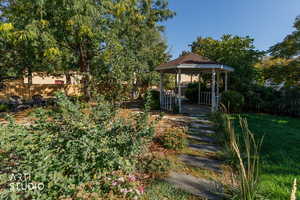 View of yard featuring a gazebo and a patio