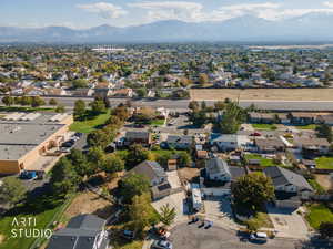 Aerial overview of property's location featuring nearby suburban area