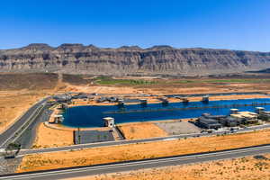 Aerial overview of property's location featuring a water and mountain view