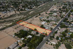 Aerial view of residential area with property boundaries highlighted