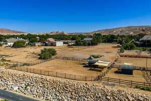View of mountain backdrop featuring rural landscape