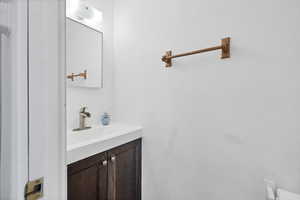 Half bath featuring vanity