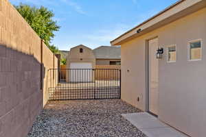 Gate featuring an outdoor structure