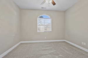 Unfurnished room with light carpet and ceiling fan