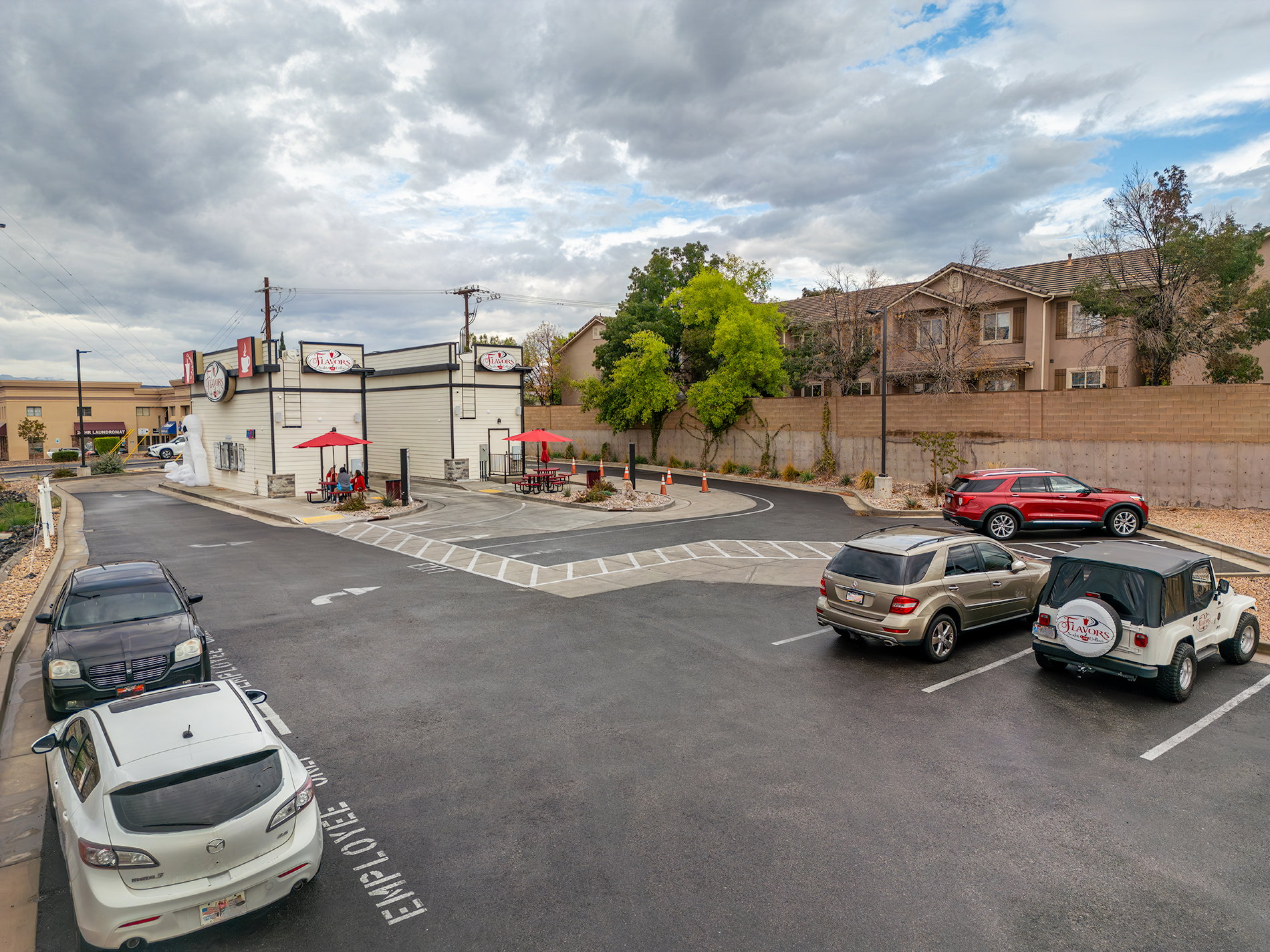 View of asphalt street with curbs