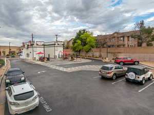View of asphalt street with curbs