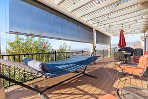 Wooden deck featuring outdoor dining space