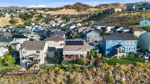 Aerial view of residential area featuring mountains