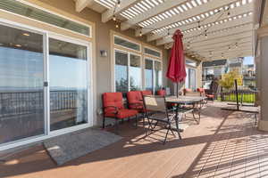 Wooden terrace featuring outdoor dining space
