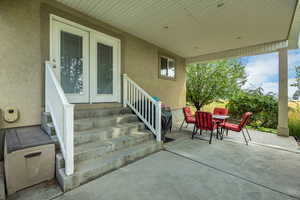 View of patio with outdoor dining space