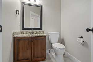 Bathroom featuring vanity and light tile patterned floors