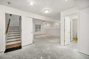 Basement stairway and den