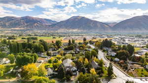 Aerial view of residential area with a mountainous background