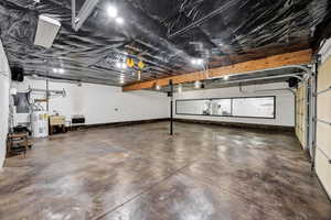 Shop with water heater and electrical panel