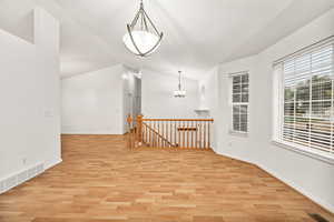 Living room with light wood-type flooring