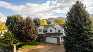 View of front of property featuring a mountain view