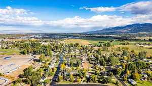 Aerial view of residential area featuring a mountain backdrop