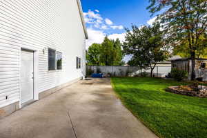 View of yard featuring a patio area and shop