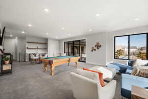 Game room with pool table and recessed lighting