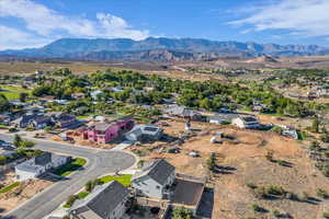 Aerial view of residential area featuring mountains