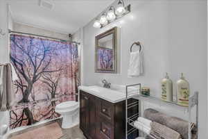 Bathroom with vanity and light wood-type flooring
