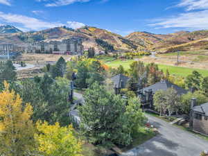 Mountain view featuring nearby suburban area
