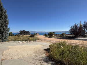 Surrounding community featuring a water view