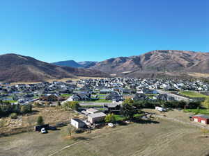 Mountain view featuring nearby suburban area